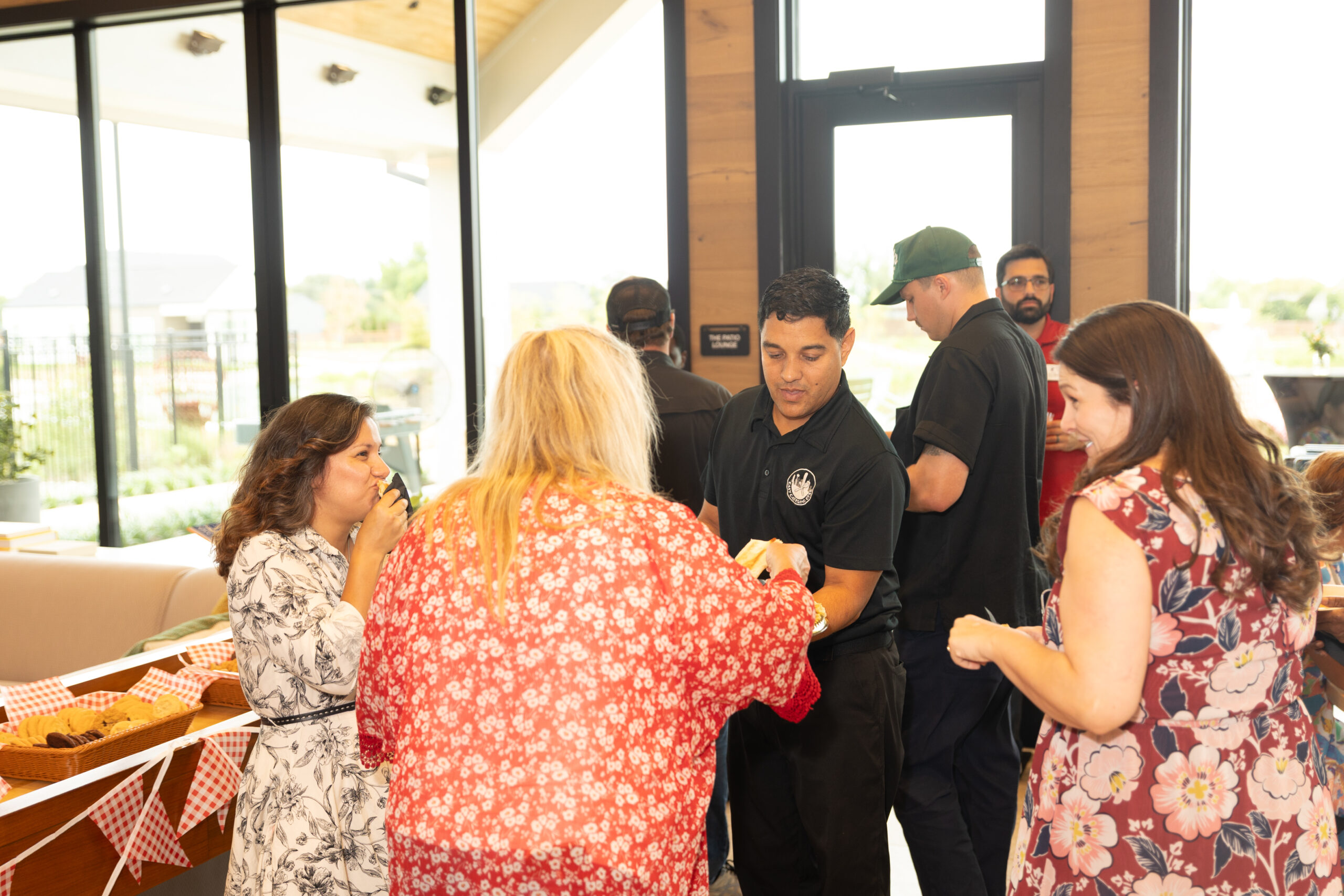 Guests enjoying catered appetizers at a community event